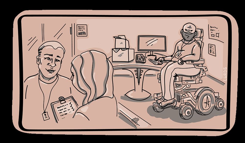 Jacobi sits with their devices in one corner while a consultant and another team member discuss their needs in another corner.